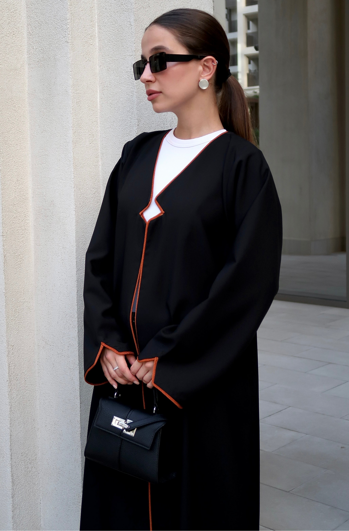 E65- Summery Black abaya with orange piping Crepe ( A - line)