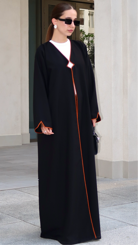 E65- Summery Black abaya with orange piping Crepe ( A - line)
