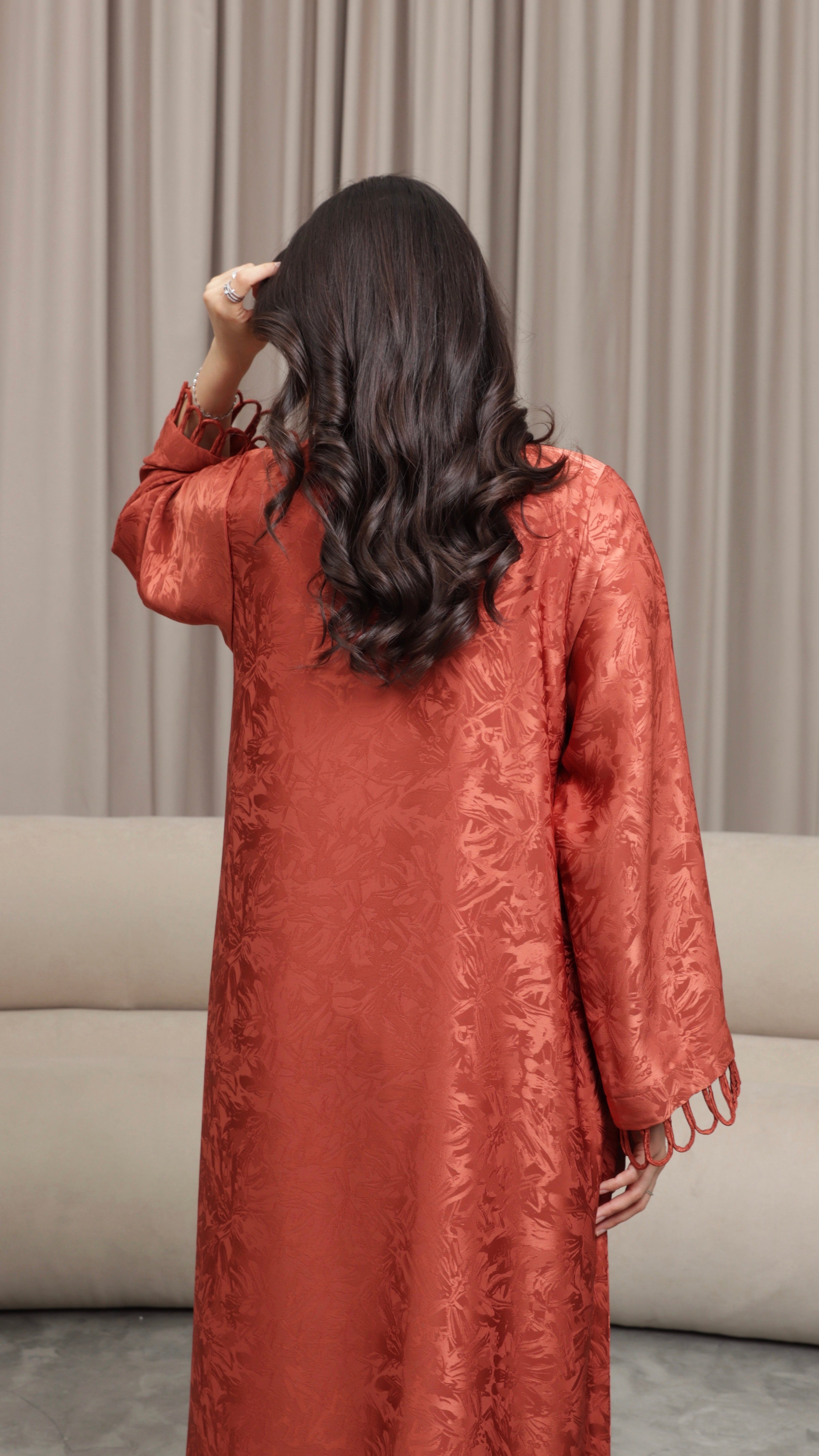 E121- Orange knot abaya