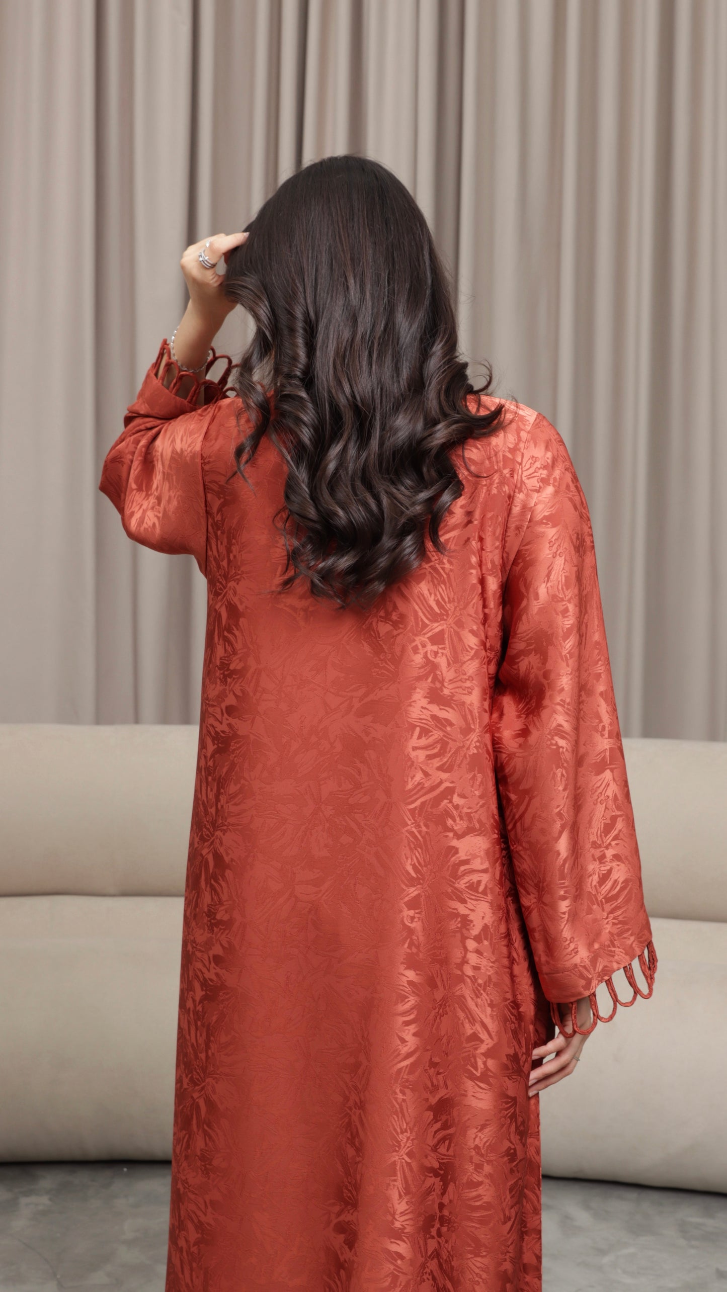 E121- Orange knot abaya