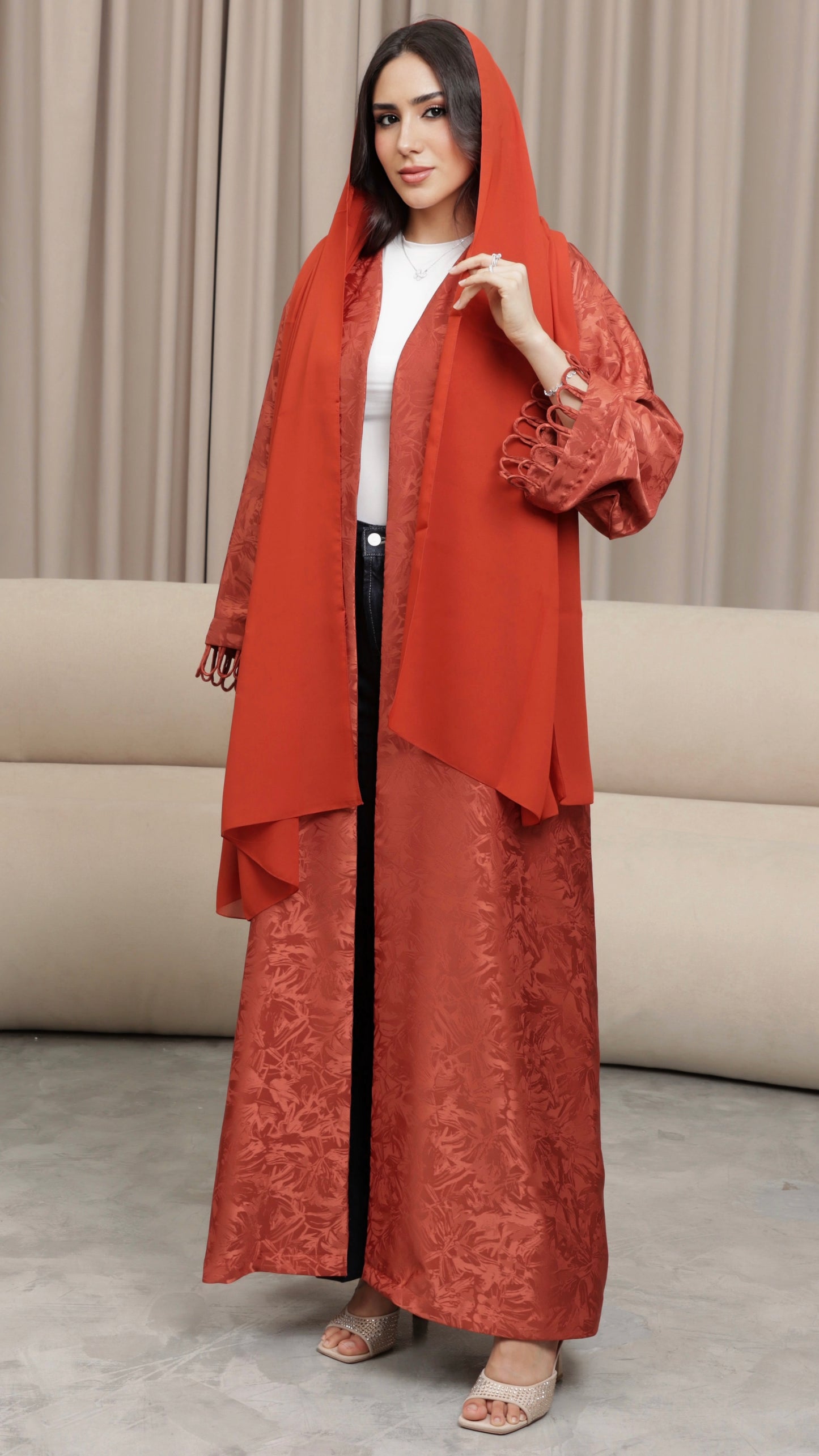 E121- Orange knot abaya